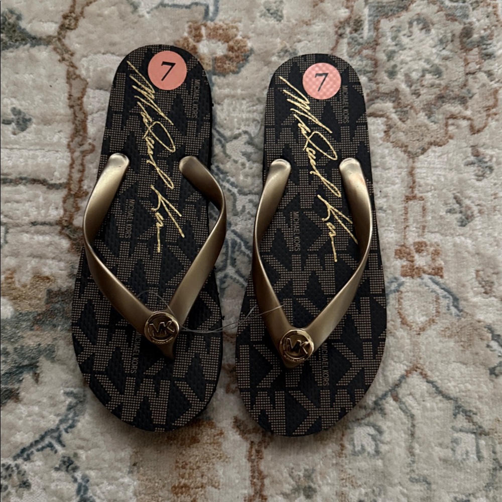 Michael Kors Gold Flip Flops
New